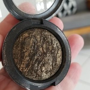 Mac eyeshadow.  Guilt by association.